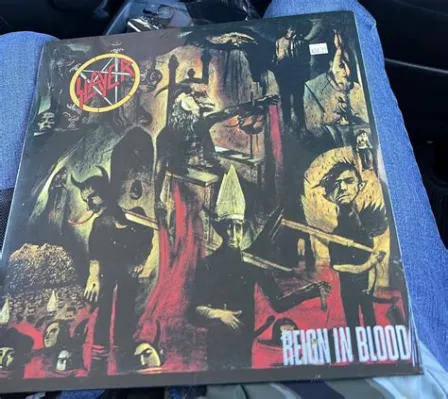  Raining Blood Bir Ölüm Metali Şöleni: Kemikleri Sıkıştıran Riflerle Çığlık Atın